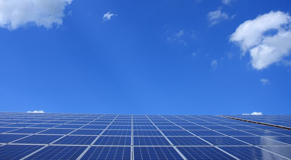 Close-up of solar panels under clear Baghdad sky